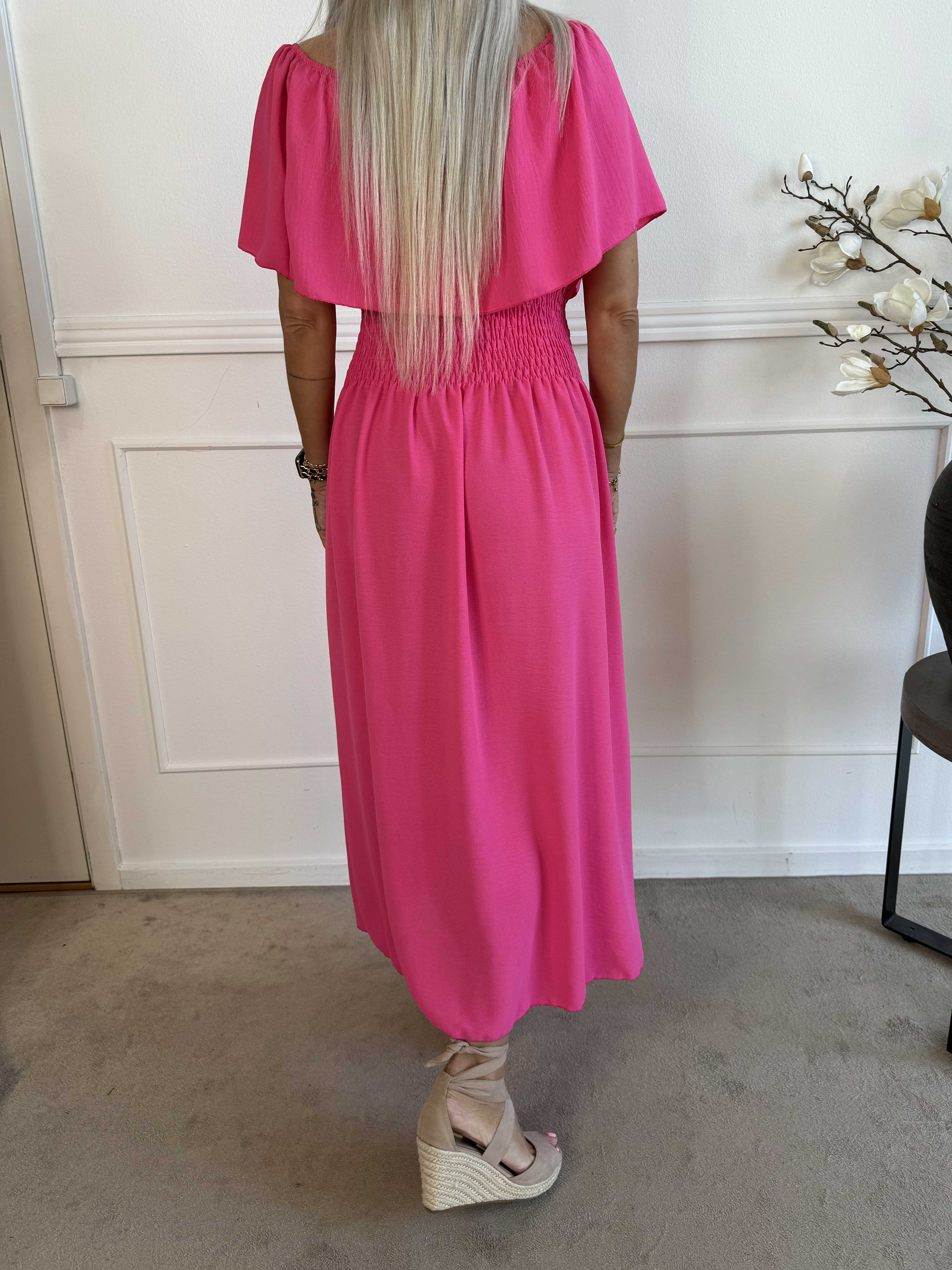 Rachel - Lång klänning med fickor och volang i nederkanten